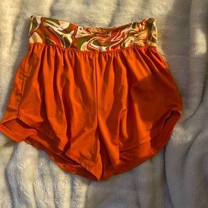 Woman’s Orange with tie dye waist band SO athletic shorts size M